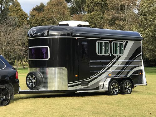 Professional horse float weighing service checking axles and tow-ball for safety.